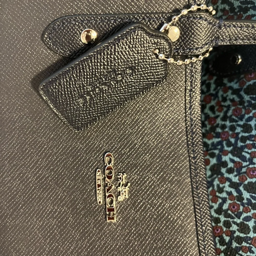 Coach EUC Reversible Navy & flower Tote with Structured Design and Gold Accents - Picture 9 of 14